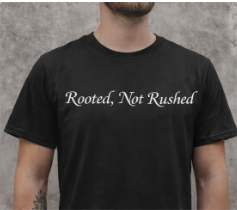 Rooted, Not Rushed – Black Unisex Statement Short Sleeve T-Shirt