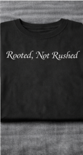 Rooted, Not Rushed – Black Unisex Statement Short Sleeve T-Shirt